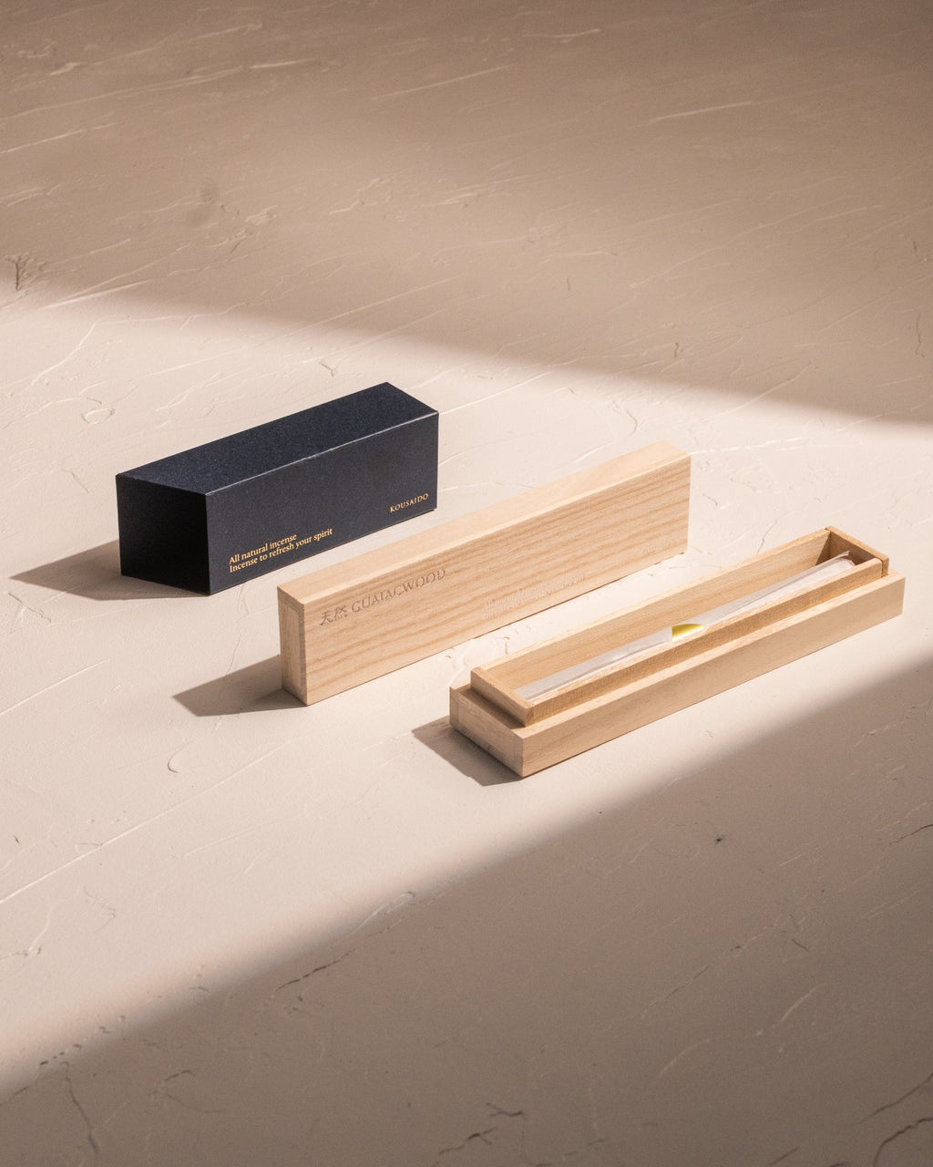 Kousaido Guaiac Wood incense with bamboo box, blue sleeve, and 20 incense sticks