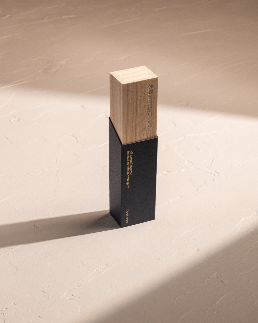 Kousaido Natural Premium Guaiac Wood incense in bamboo box with blue paper sleeve