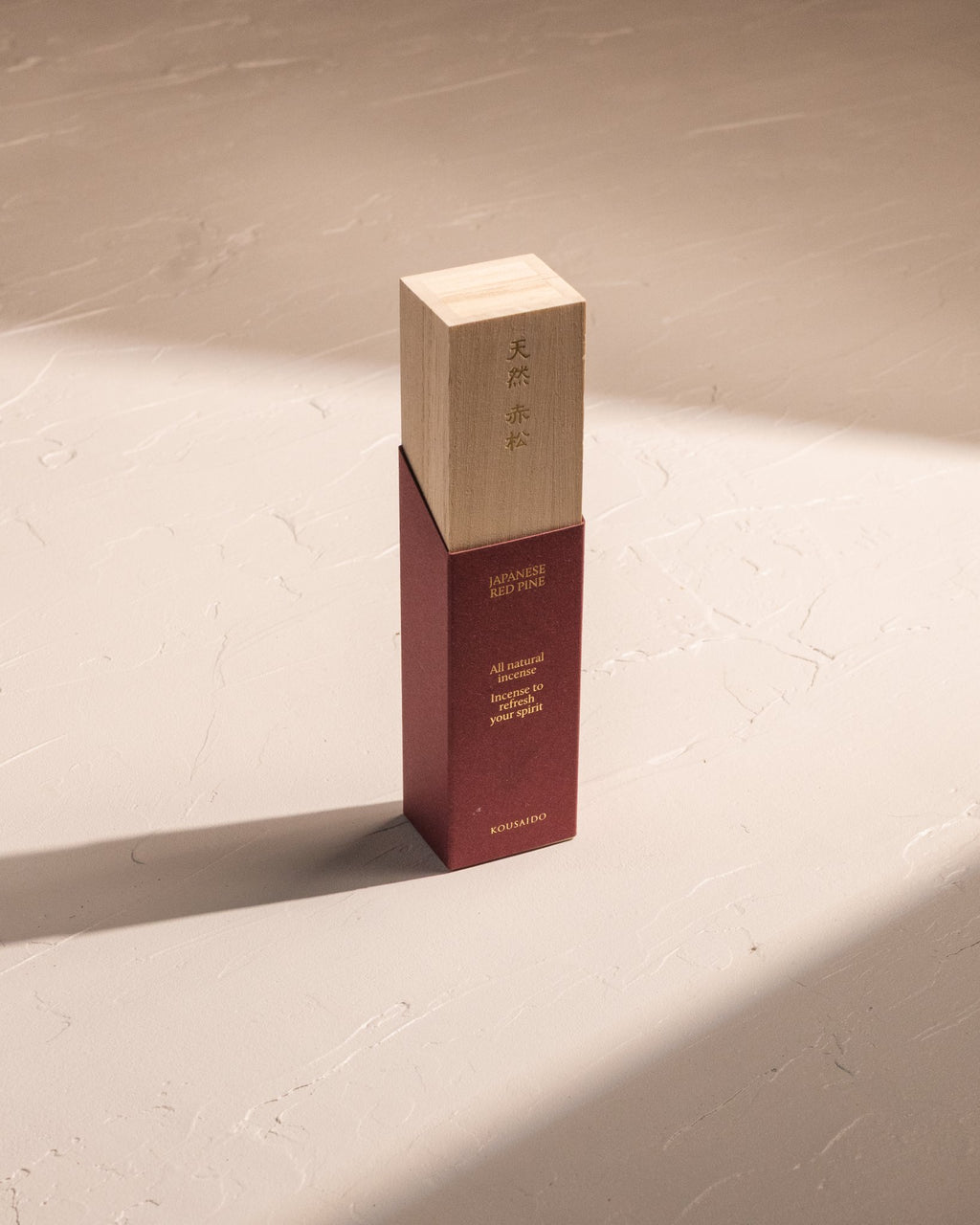 Kousaido Natural Premium Japanese Red Pine incense in bamboo box with red paper sleeve