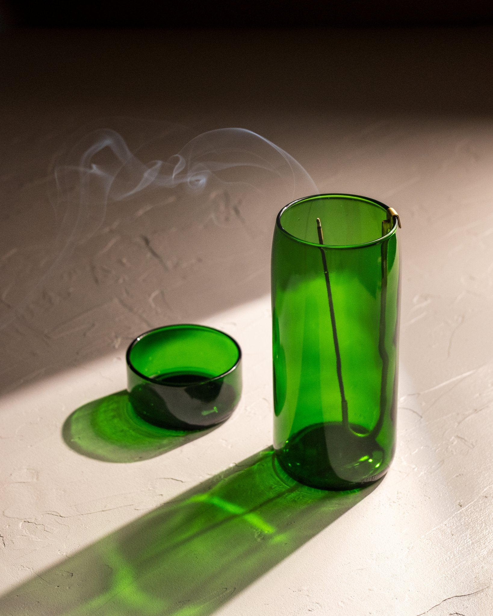 Emerald Green recycled bottle incense vase with matching glass dish and incense smoke rising above.