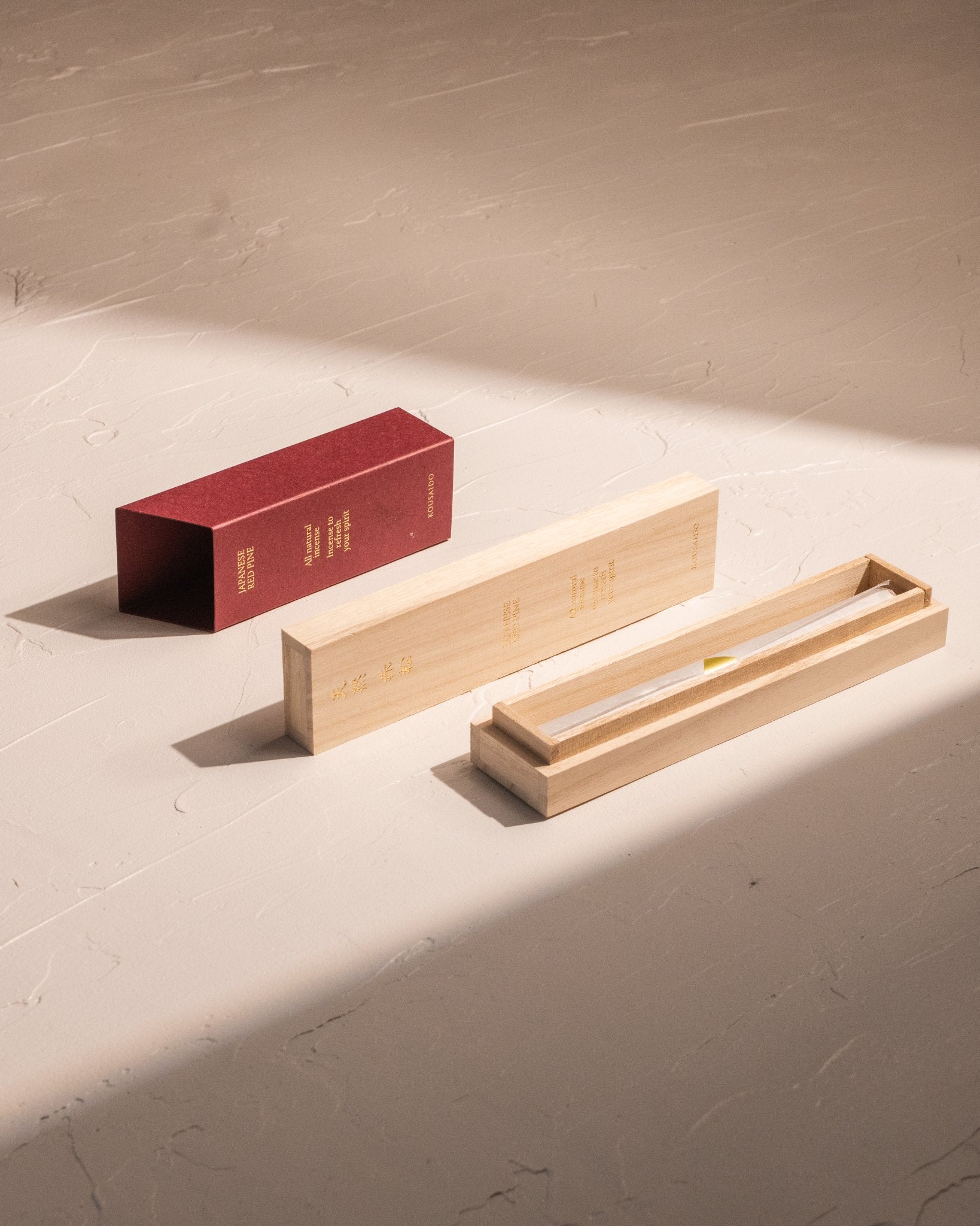 Kousaido Japanese Red Pine incense with bamboo box, red sleeve, and 20 incense sticks