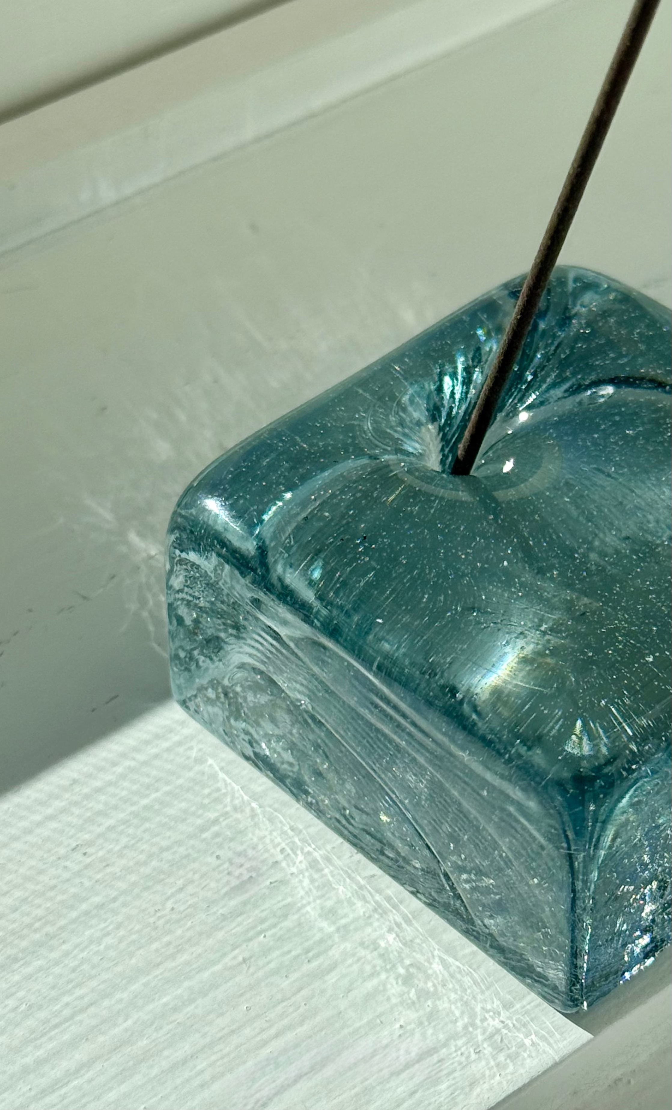 Close up of IYE Square Incense holder, made from recycled glass in Japan