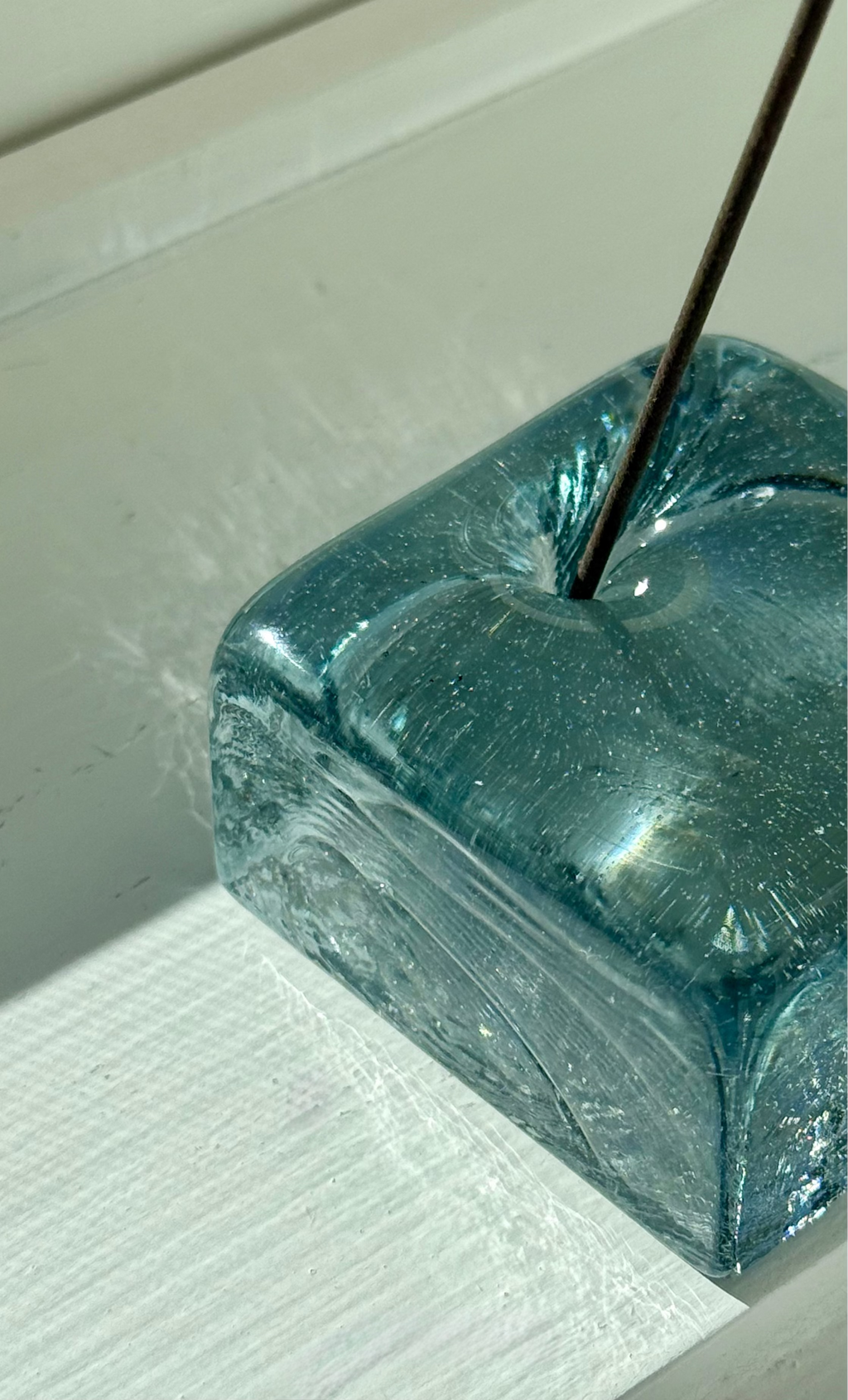 Close up of IYE Square Incense holder, made from recycled glass in Japan
