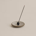 Black sphere adjustable incense holder with incense stick