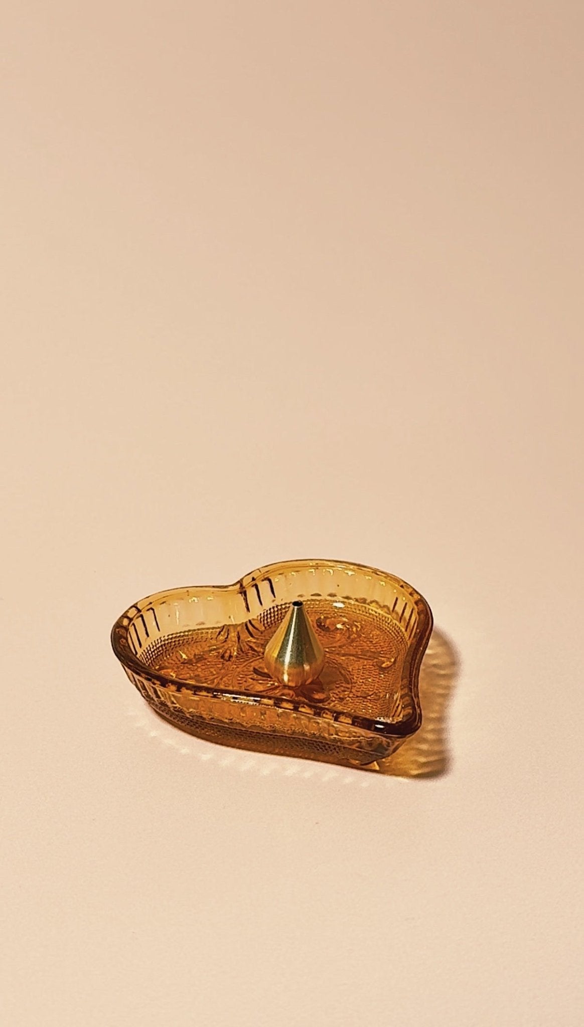 Vintage Tiara “Sandwich Amber” pressed heart shaped glass with brass incense holder