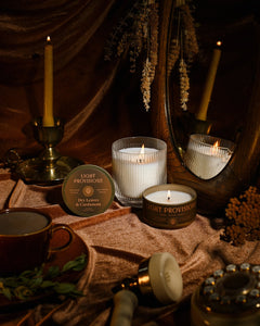 Light Provisions Dry Leaves & Cardamom candles in glass tumbler and travel tin styled with brass in cottagecore aesthetic