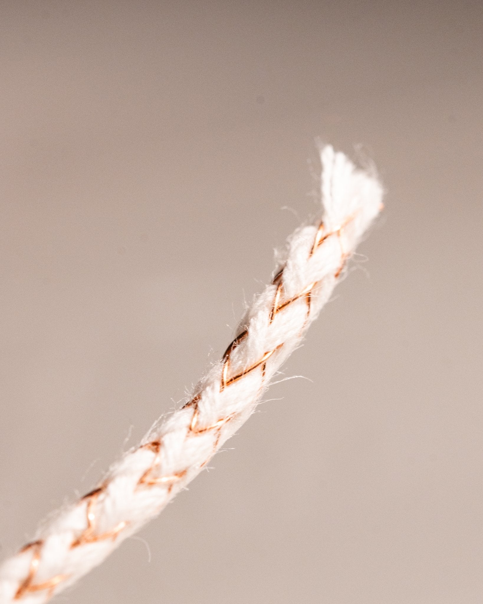 Detailed view of replacement wick tip for refillable petrol lighters