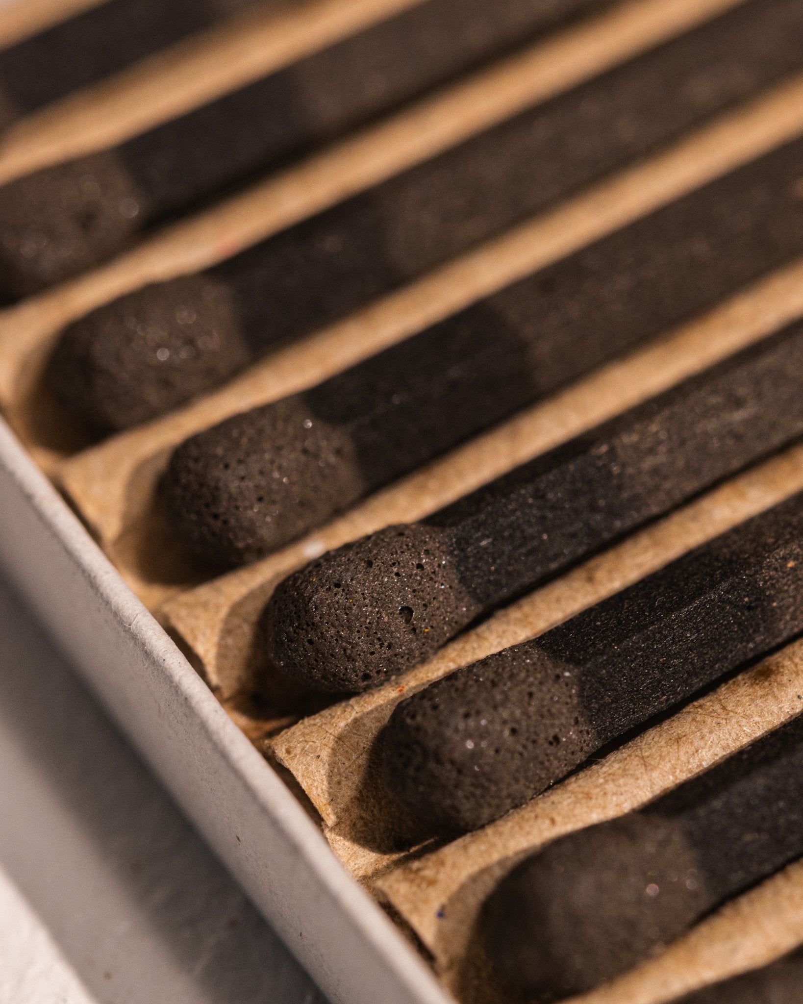 Close-up of HIBI Cedarwood incense matches made to strike and burn like a match