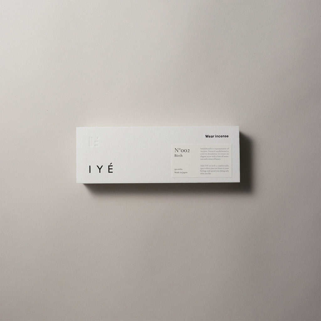 IYE "Birth" White incense box with black text on a beige background