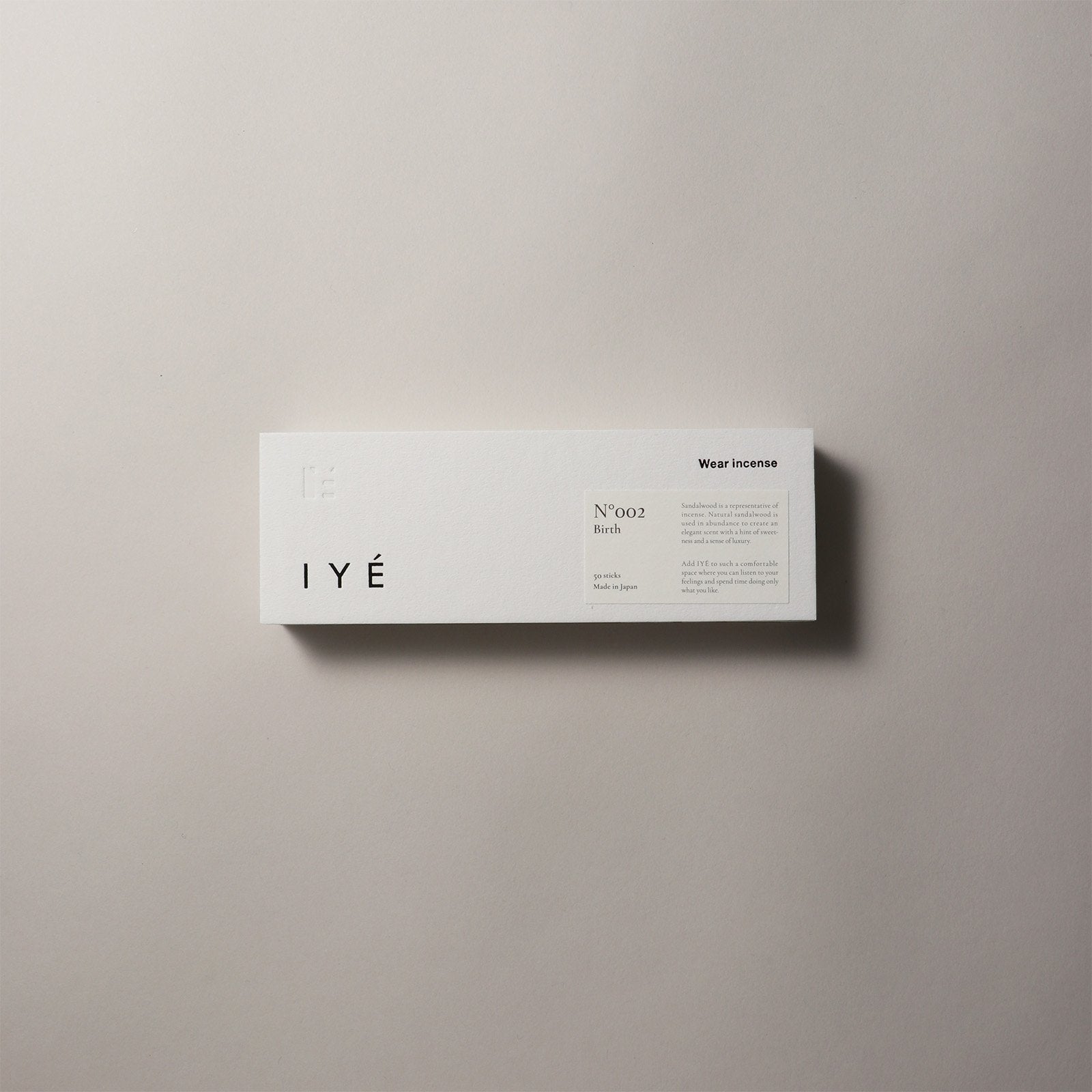 IYE "Birth" White incense box with black text on a beige background