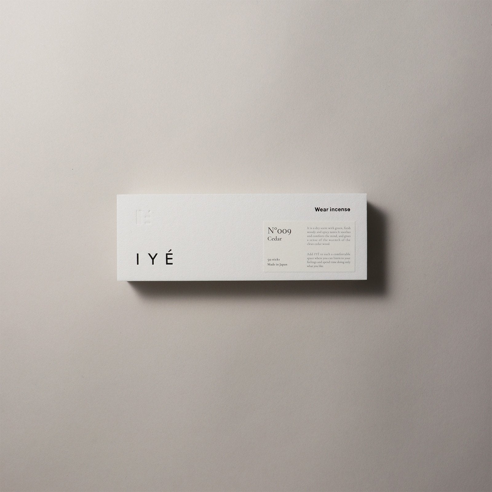 IYé IYÉ No. 009 Cedar — Japanese Incense product packaging on a beige background