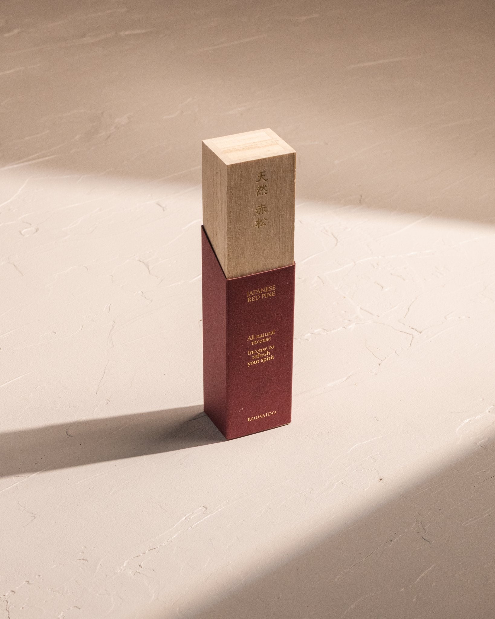 Kousaido Natural Premium Japanese Red Pine incense in bamboo box with red paper sleeve