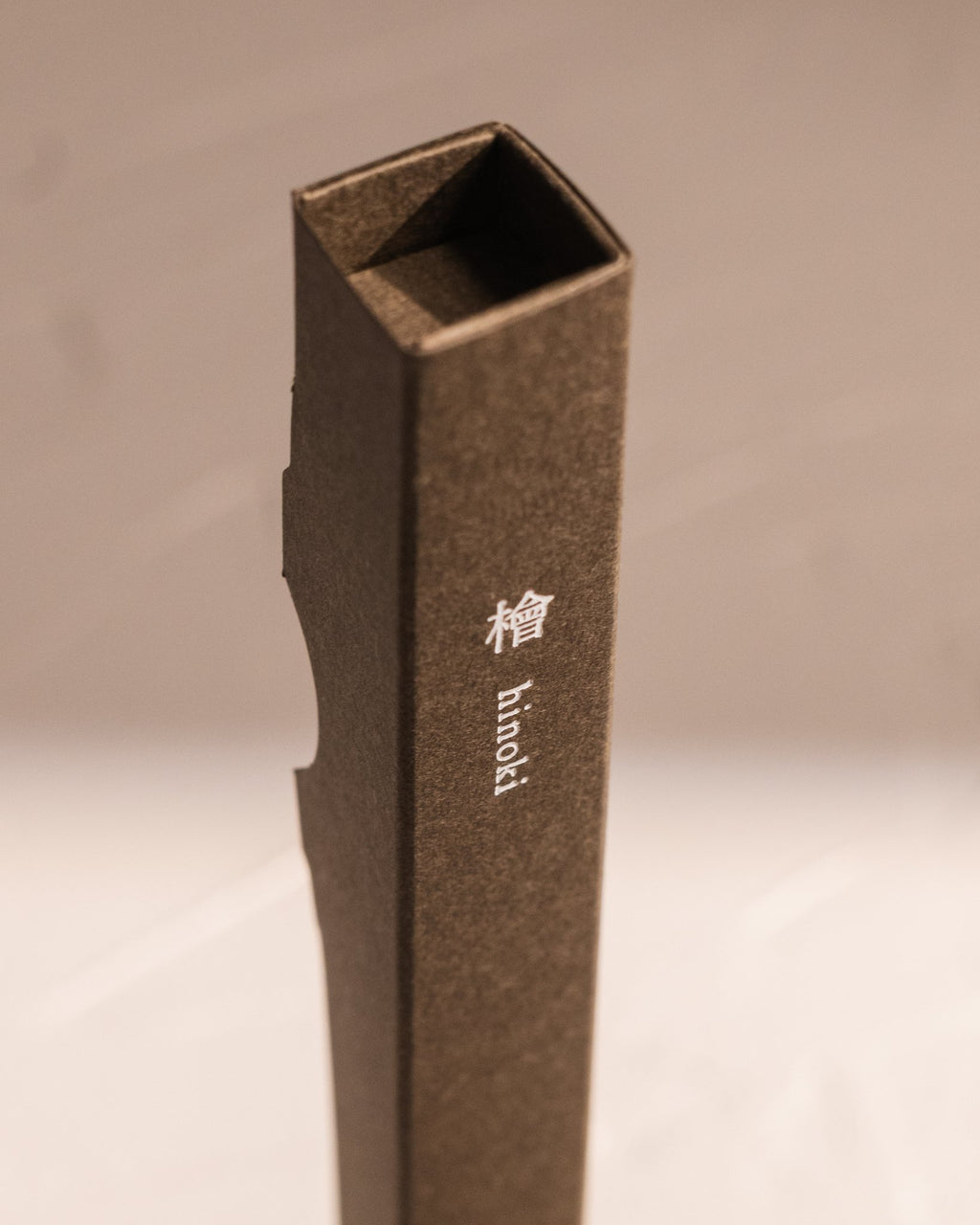 Close up of Kousaido Waboku Hinoki incense package made from a single folded paper sleeve