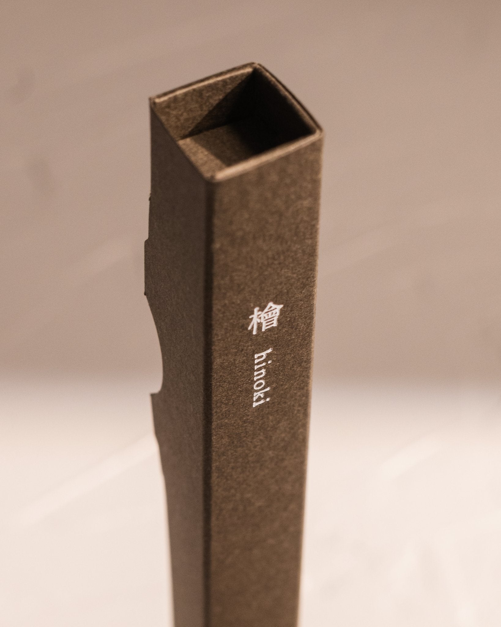 Close up of Kousaido Waboku Hinoki incense package made from a single folded paper sleeve