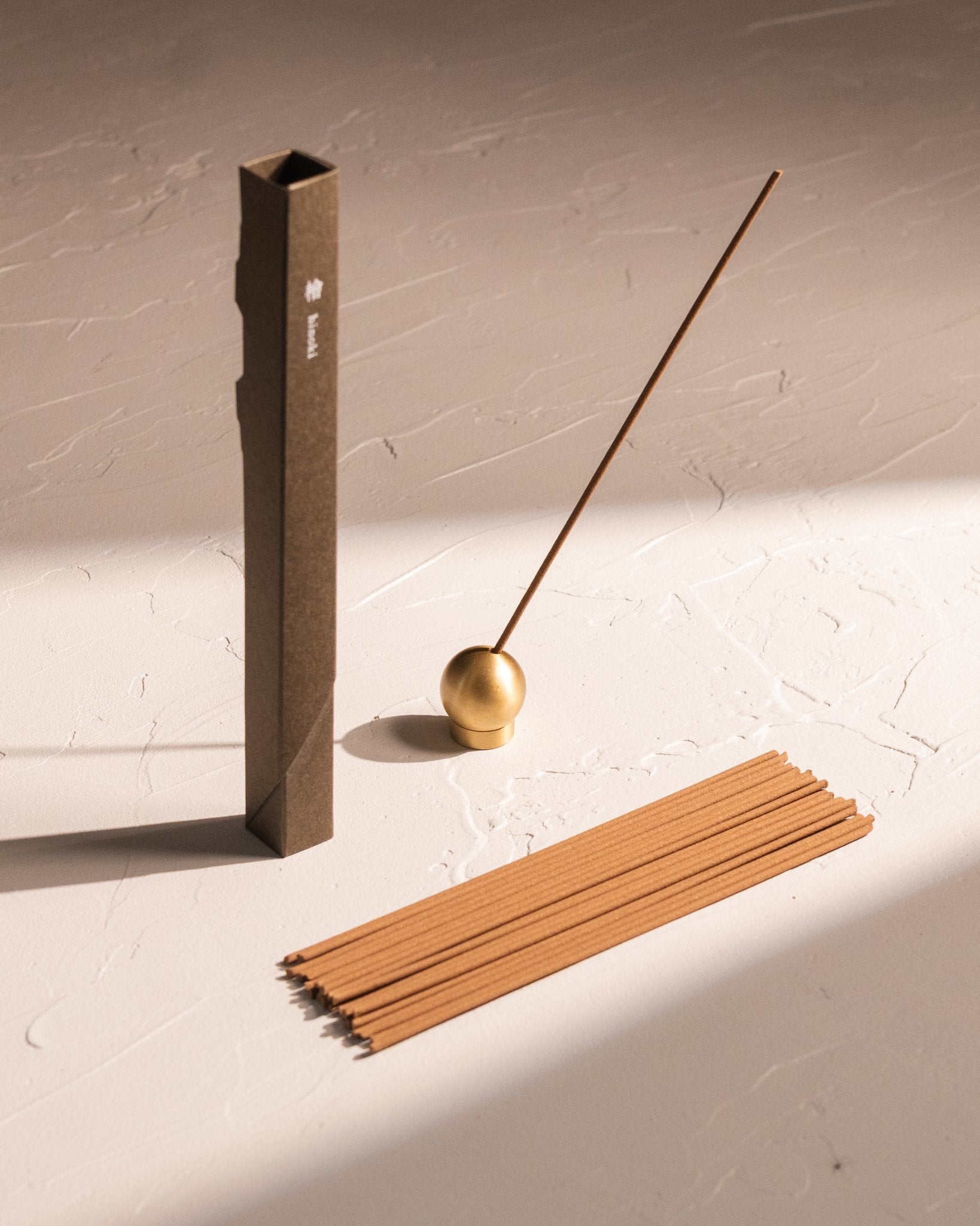 Kousaido Waboku Hinoki incense with brass holder and Japanese-style paper packaging