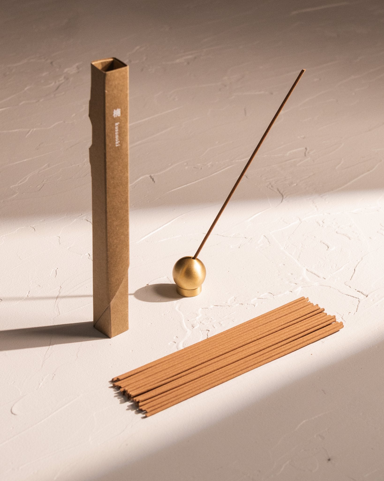 Kousaido Waboku Kusunoki incense with brass holder and Japanese-style paper packaging