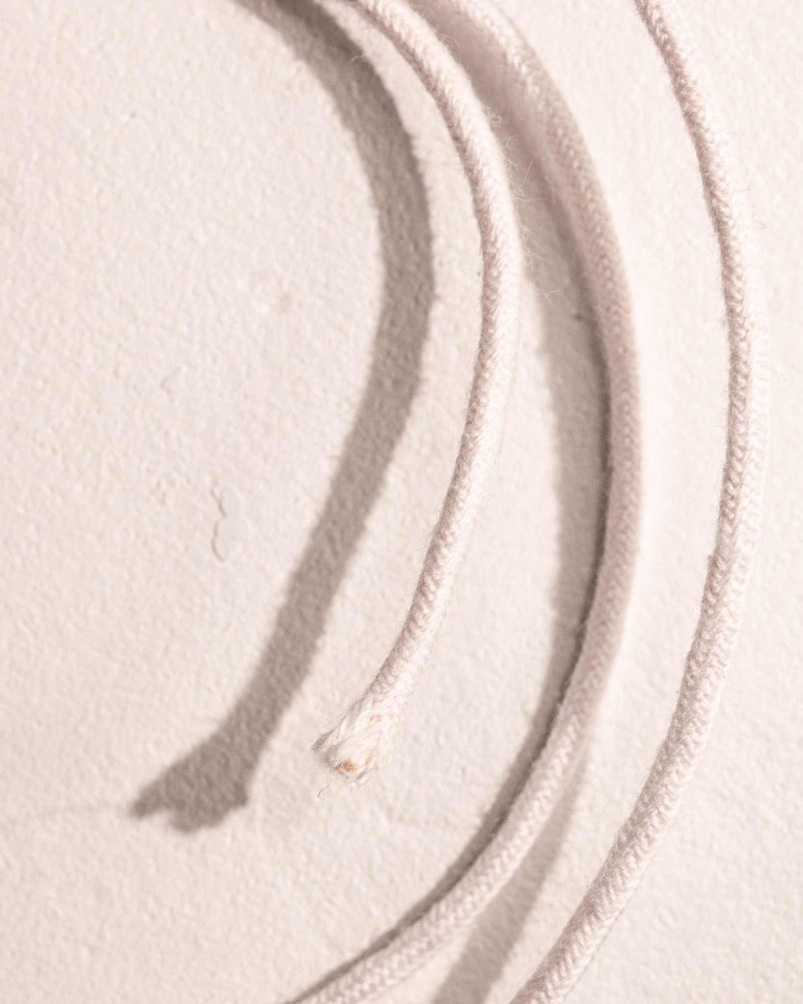 Close-up of braided cotton wick for refillable petrol lighters