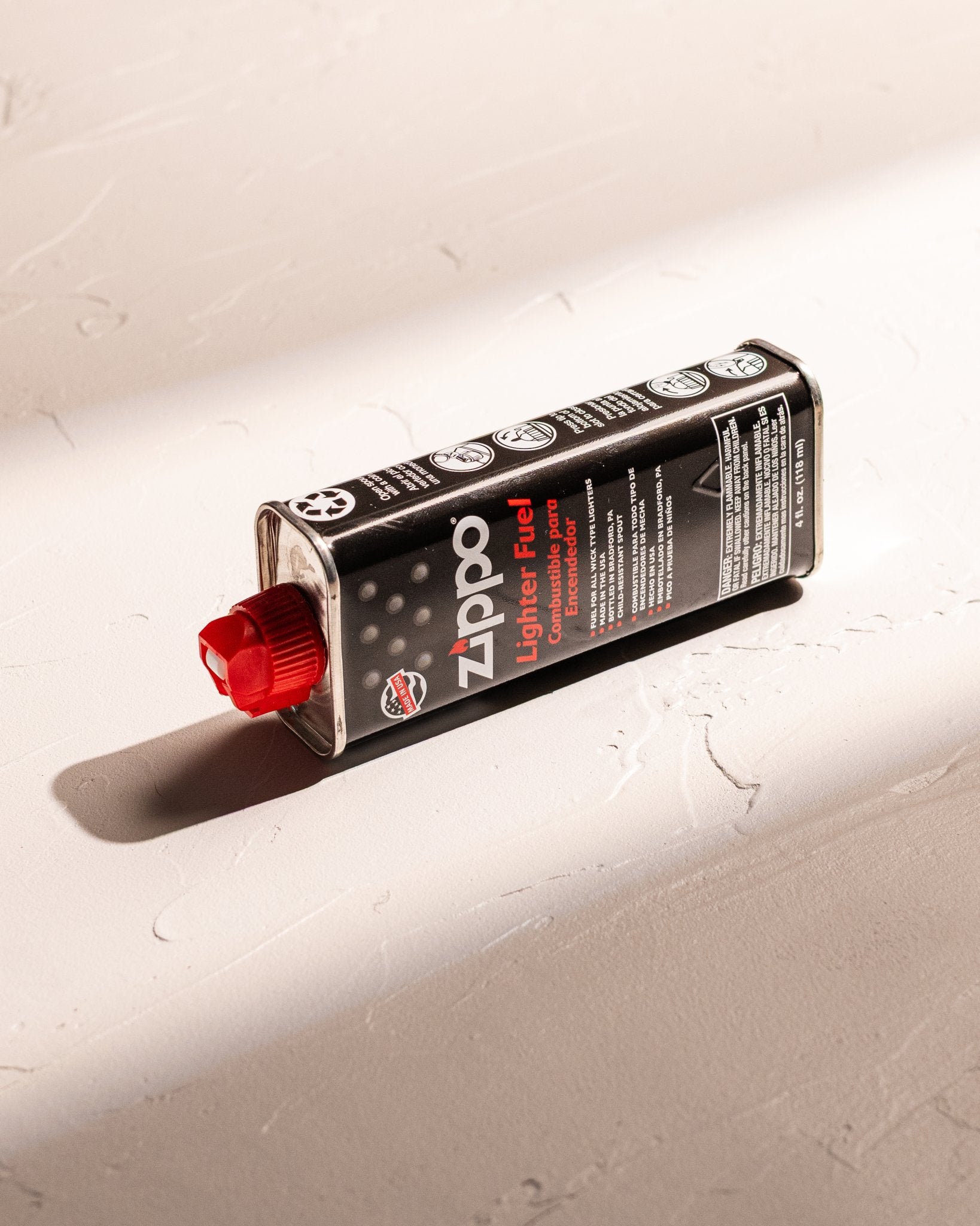 Zippo lighter fluid and replacement flint for lighter maintenance