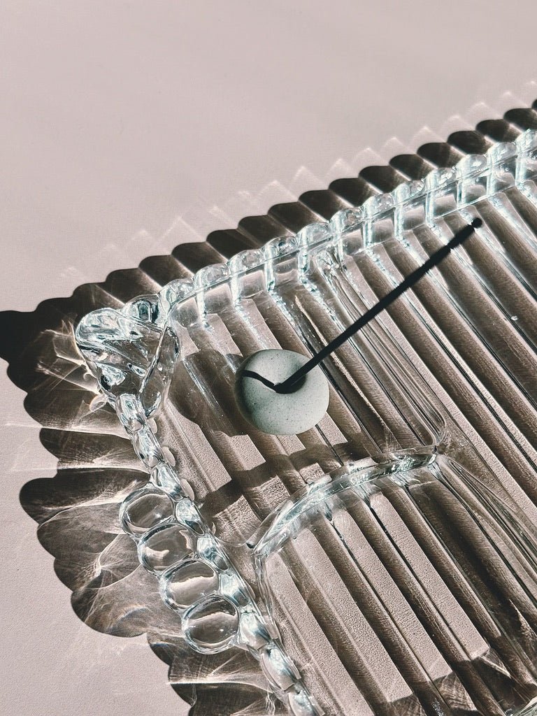 Pebble incense holder and ribbed vintage tray