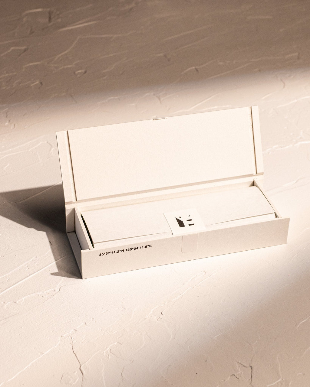 Open box of IYÉ No. 001 Birth coreless incense, handmade in Japan