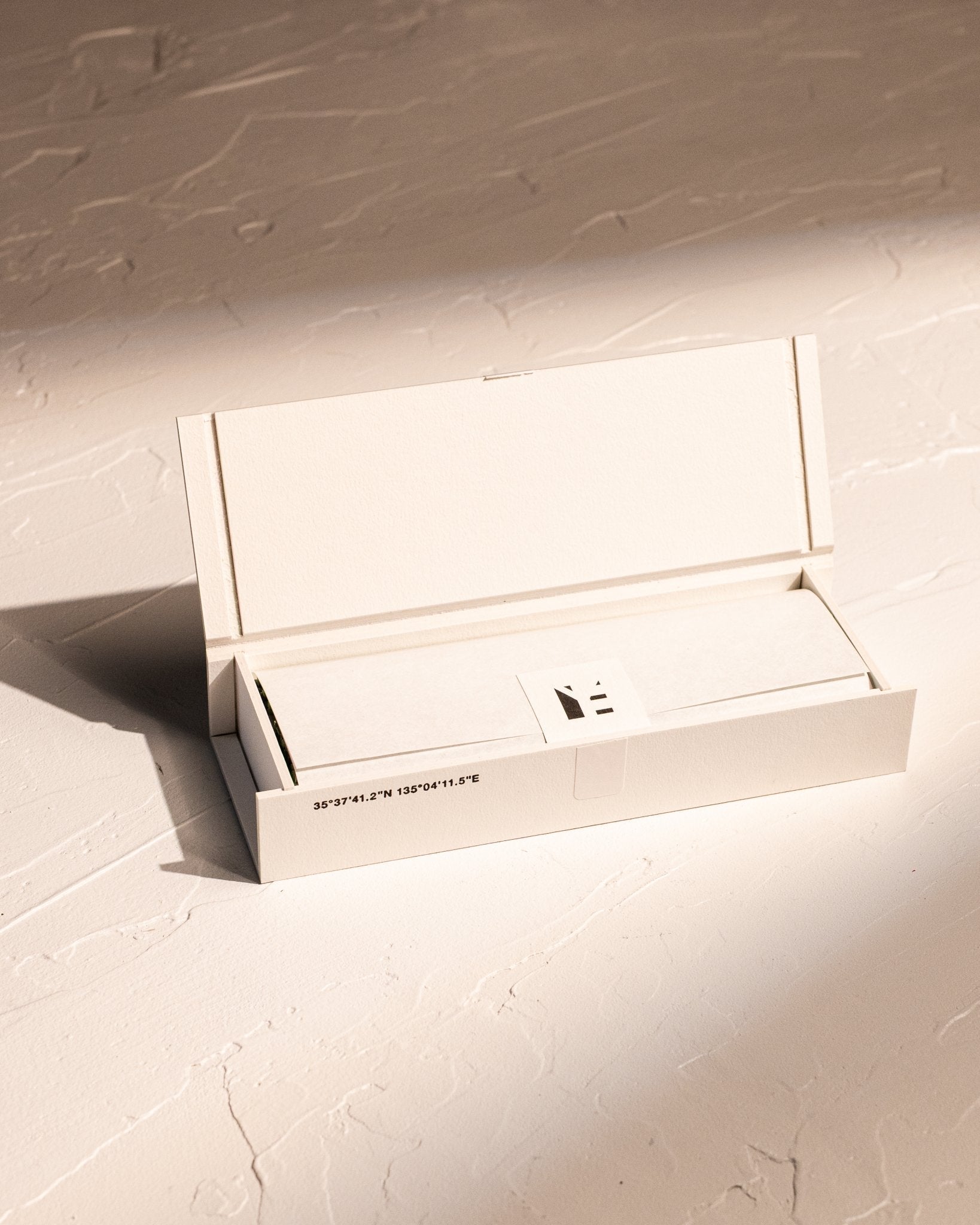 Open box of IYÉ No. 001 Birth coreless incense, handmade in Japan