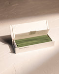 Open box of IYÉ No. 007 Sandalwood coreless incense, handmade in Japan