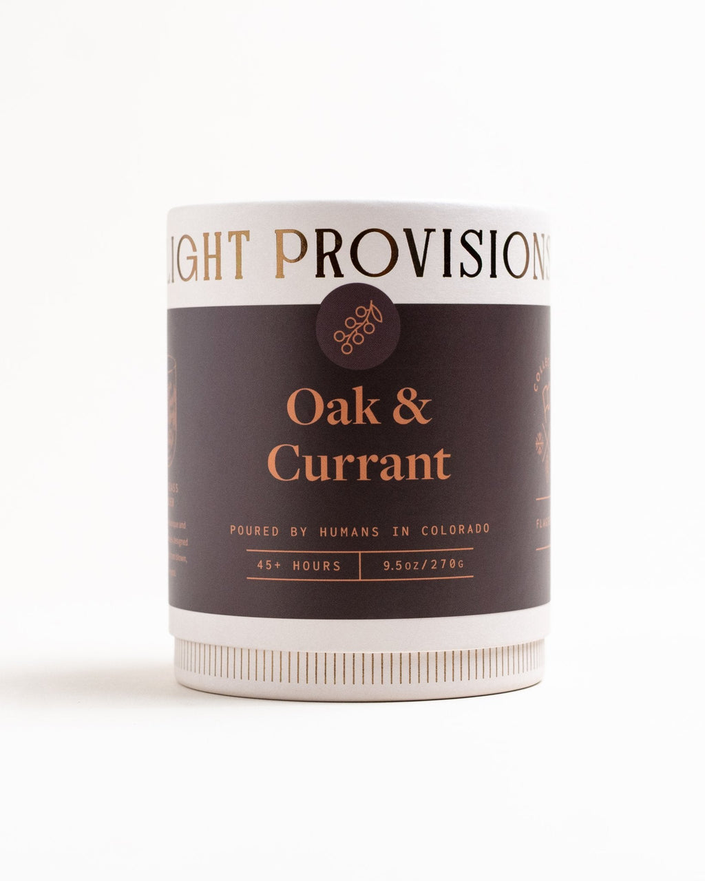 Oak and Currant Candle in 9.5 oz ribbed glass tumbler with dark label on white background