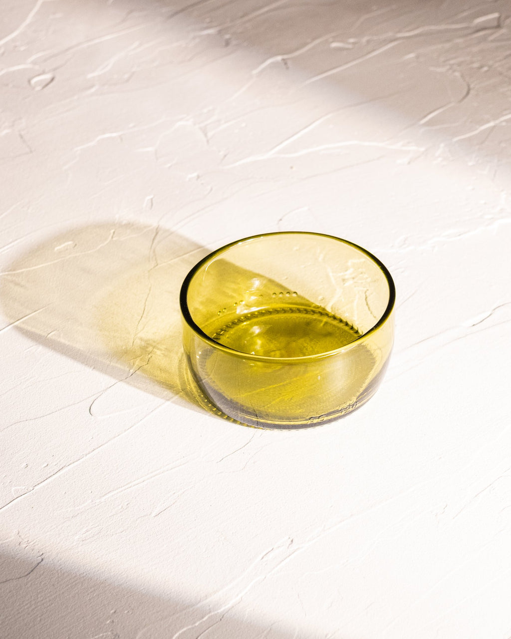Olive reclaimed bottle glass dish made from locally collected wine bottle glass