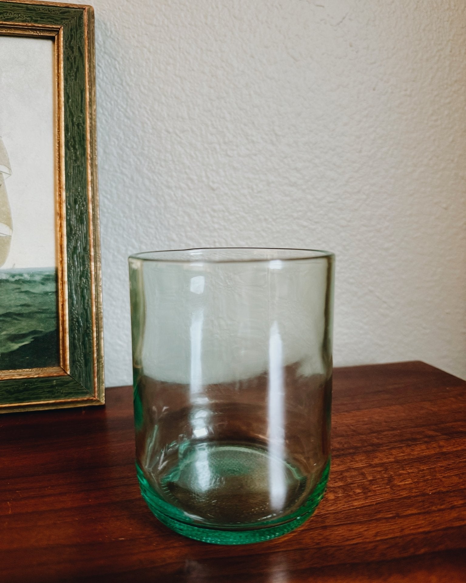 Clear aqua tumbler made from recycled wine bottles, perfect for cocktails or reuse after burning Light Provisions candle.