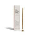 Palo Santo hand-rolled incense stick with brass holder, photographed beside the product box on a neutral background.