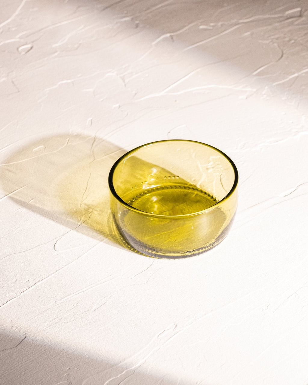 Olive reclaimed bottle glass dish made from locally collected wine bottle glass