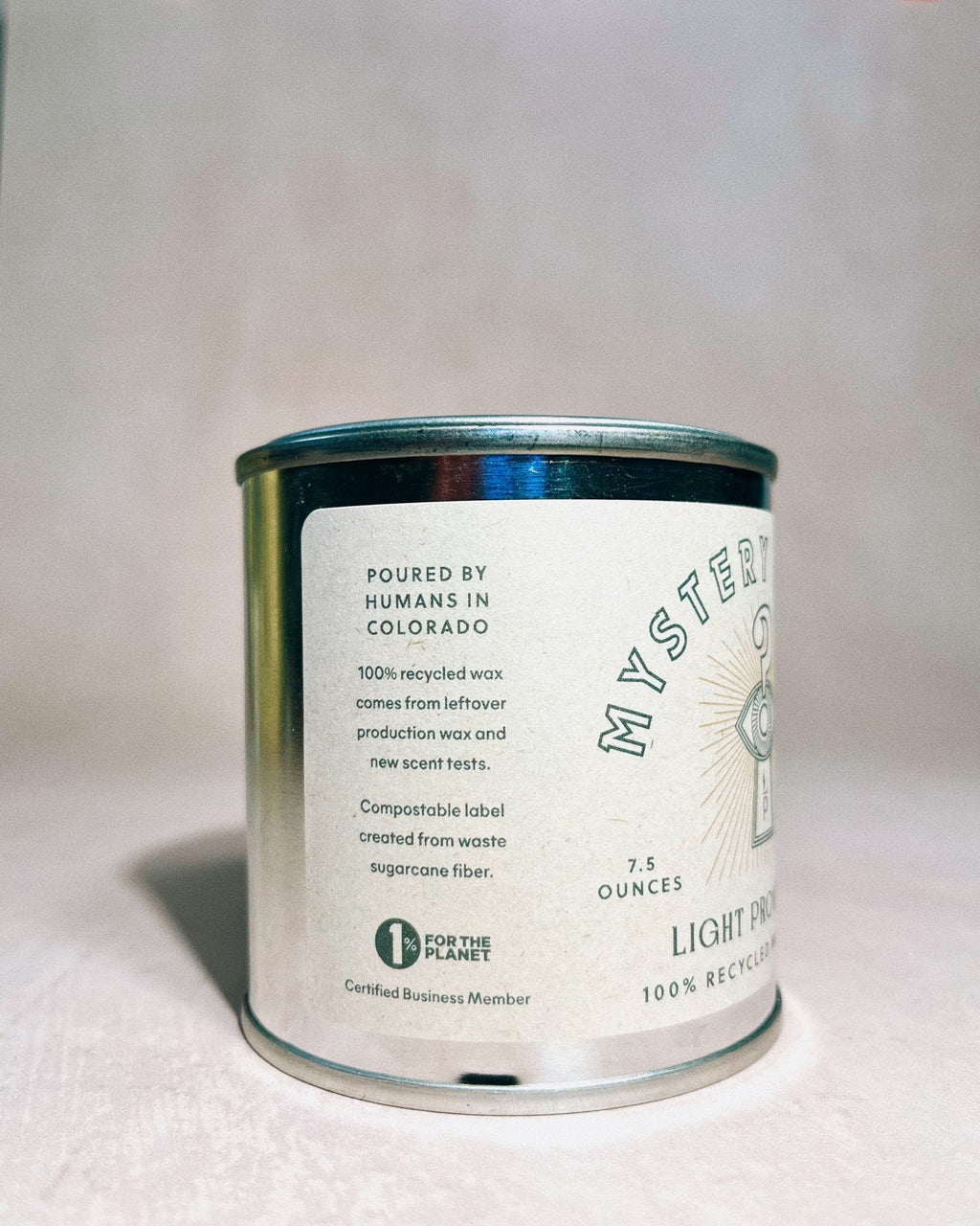 Side label of Mystery Candle showing compostability 