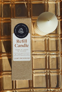Autumn Twilight Refill candle with packaging on a gold textured background