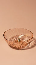 Vintage Rosaline Pink (Swirl Optic) by Cristal D’Arques–Durand with brass incense holder on beige background
