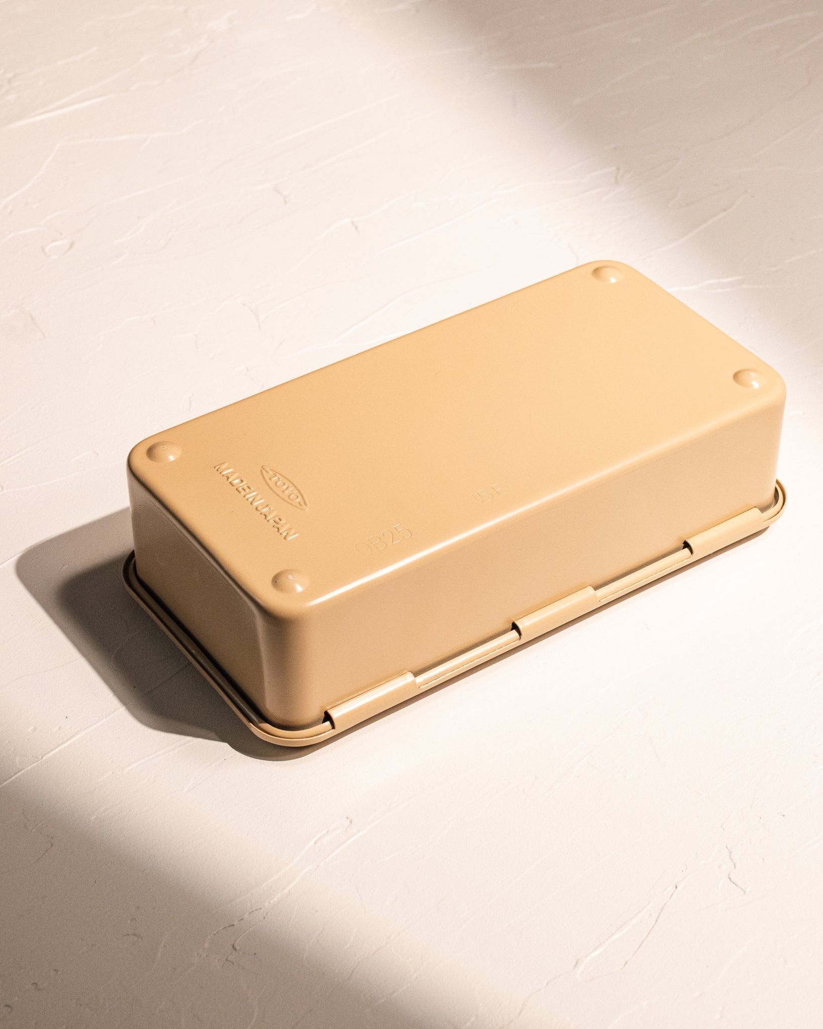 Closed Toyo Steel T-190 storage box in beige with durable pressed steel construction