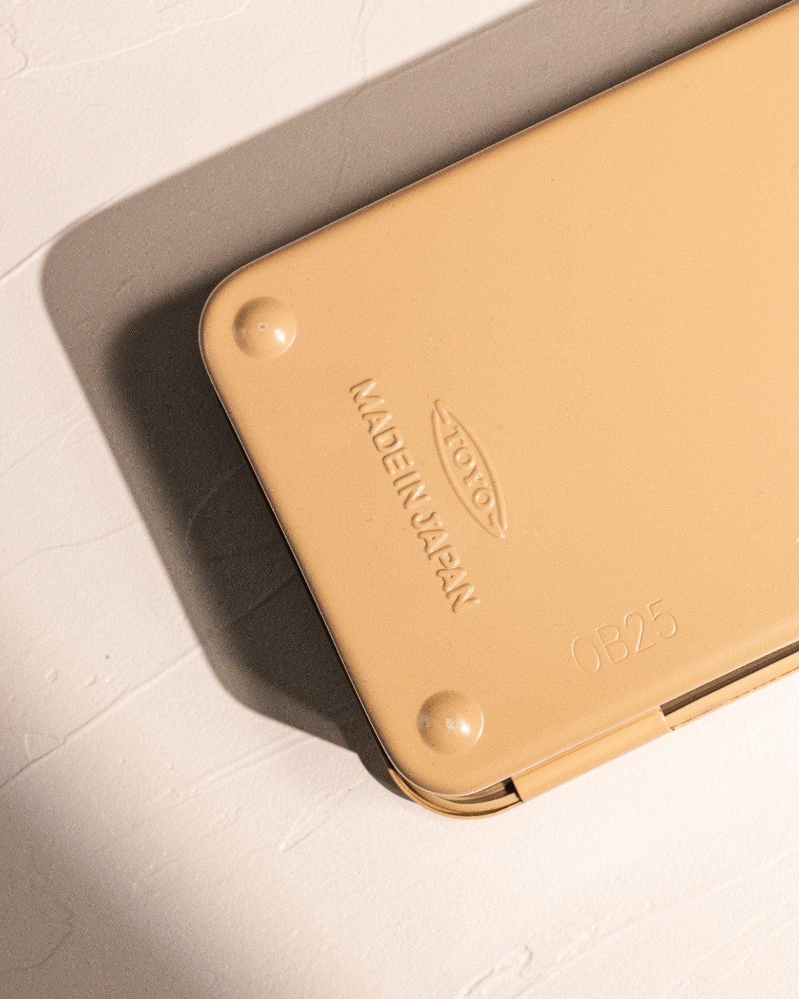 Toyo Steel logo embossed on beige T-190 storage box, 'made in japan' stamped underneath
