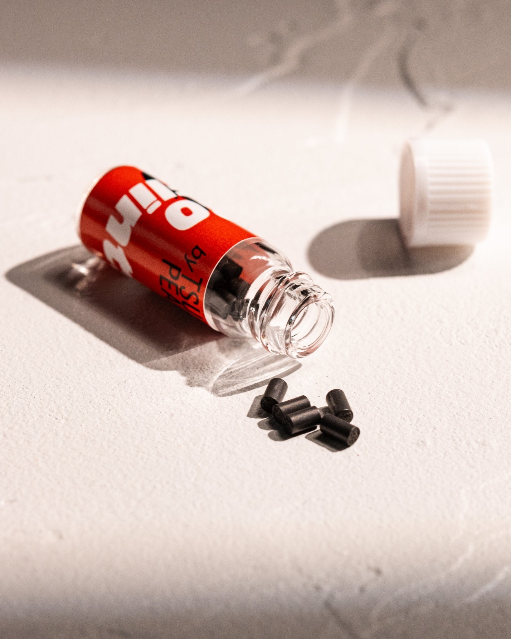 Replacement flints and storage vial for refillable lighters