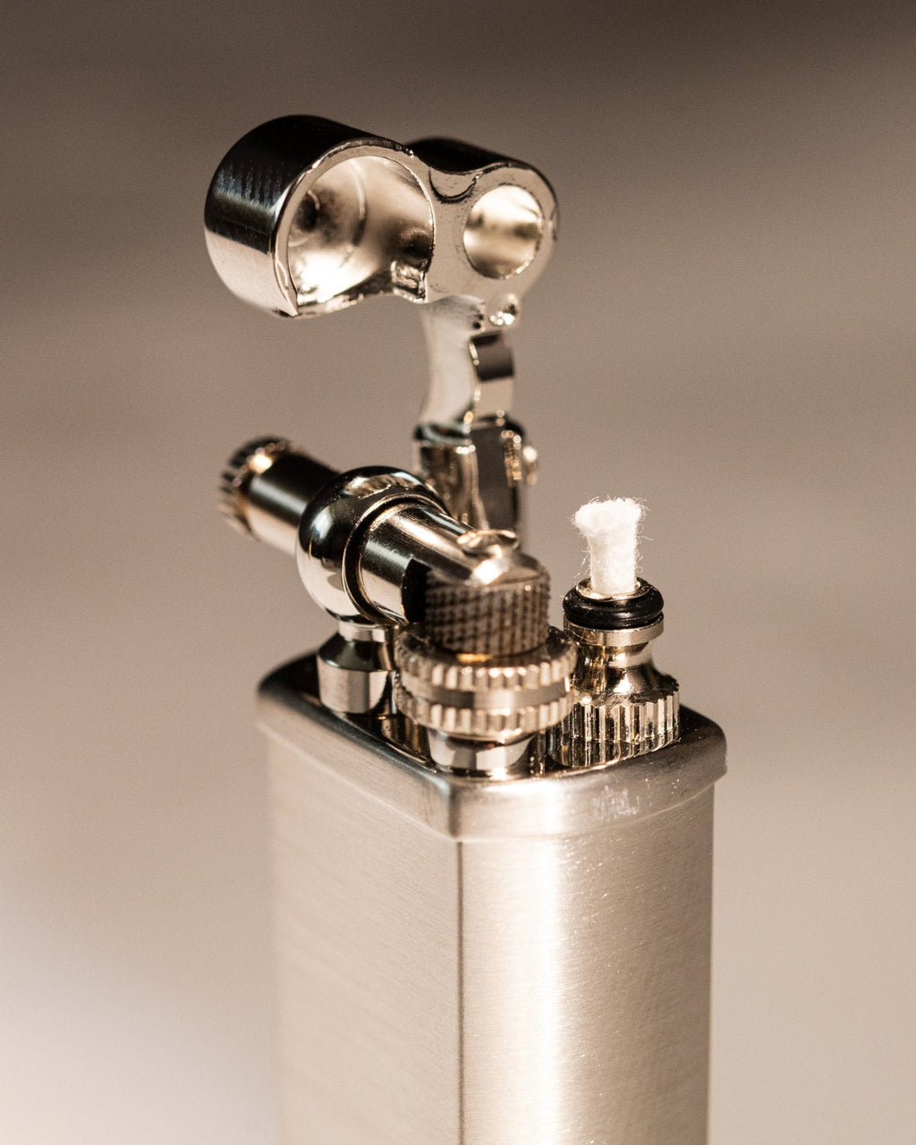 Close-up of Tsubota Pearl Bolbo silver lighter ignition assembly 
