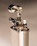 Close-up of Tsubota Pearl Bolbo silver lighter ignition assembly 