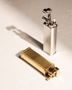 Silver and gold Tsubota Pearl Bolbo lighters 