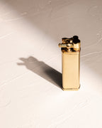 Tsubota Pearl Bolbo lighter in polished gold finish with refillable petrol design