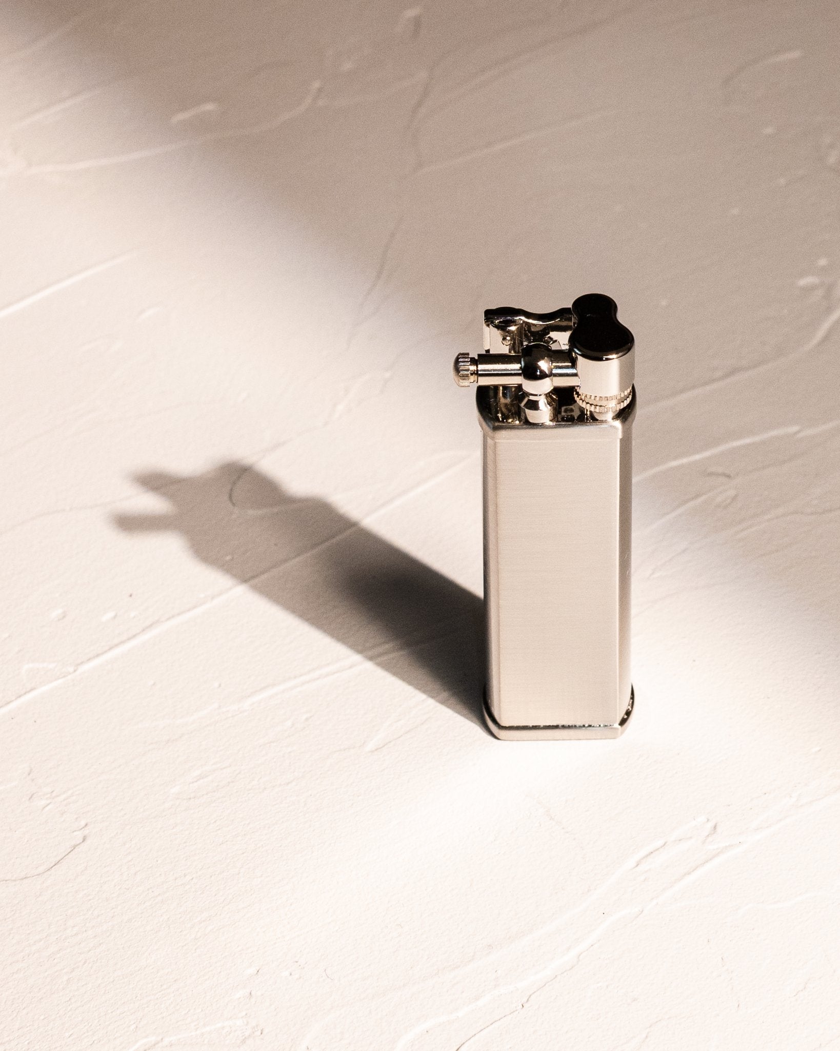 Tsubota Pearl Bolbo lighter in polished silver finish with solid brass construction