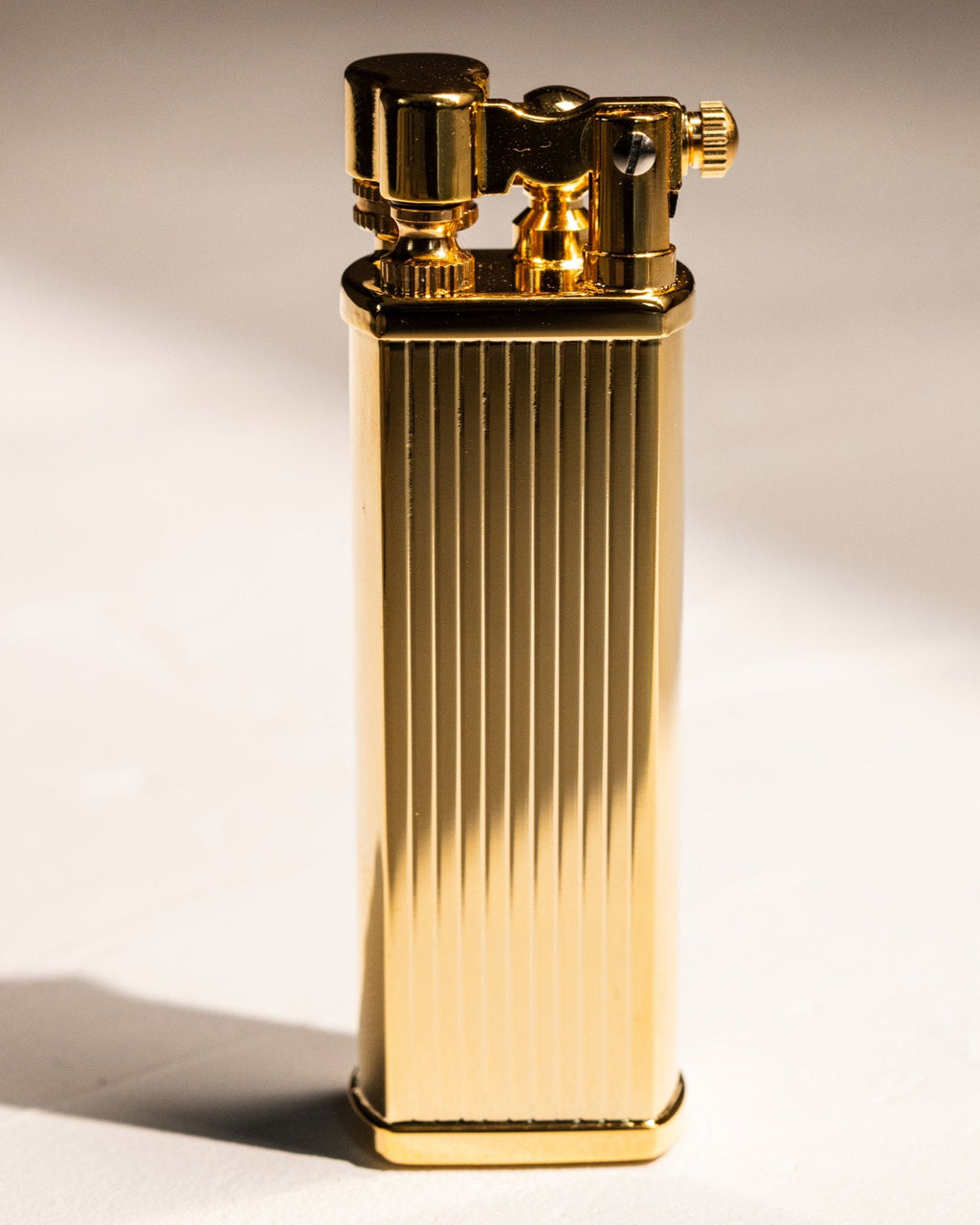 Tsubota Pearl Bolbo Striped lighter in polished gold finish, made in Japan