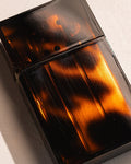 Close-up Amber marble finish on Tsubota Pearl Hard-Edge lighter