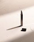 Black Tsubota Pearl Queue stick lighter with cap removed