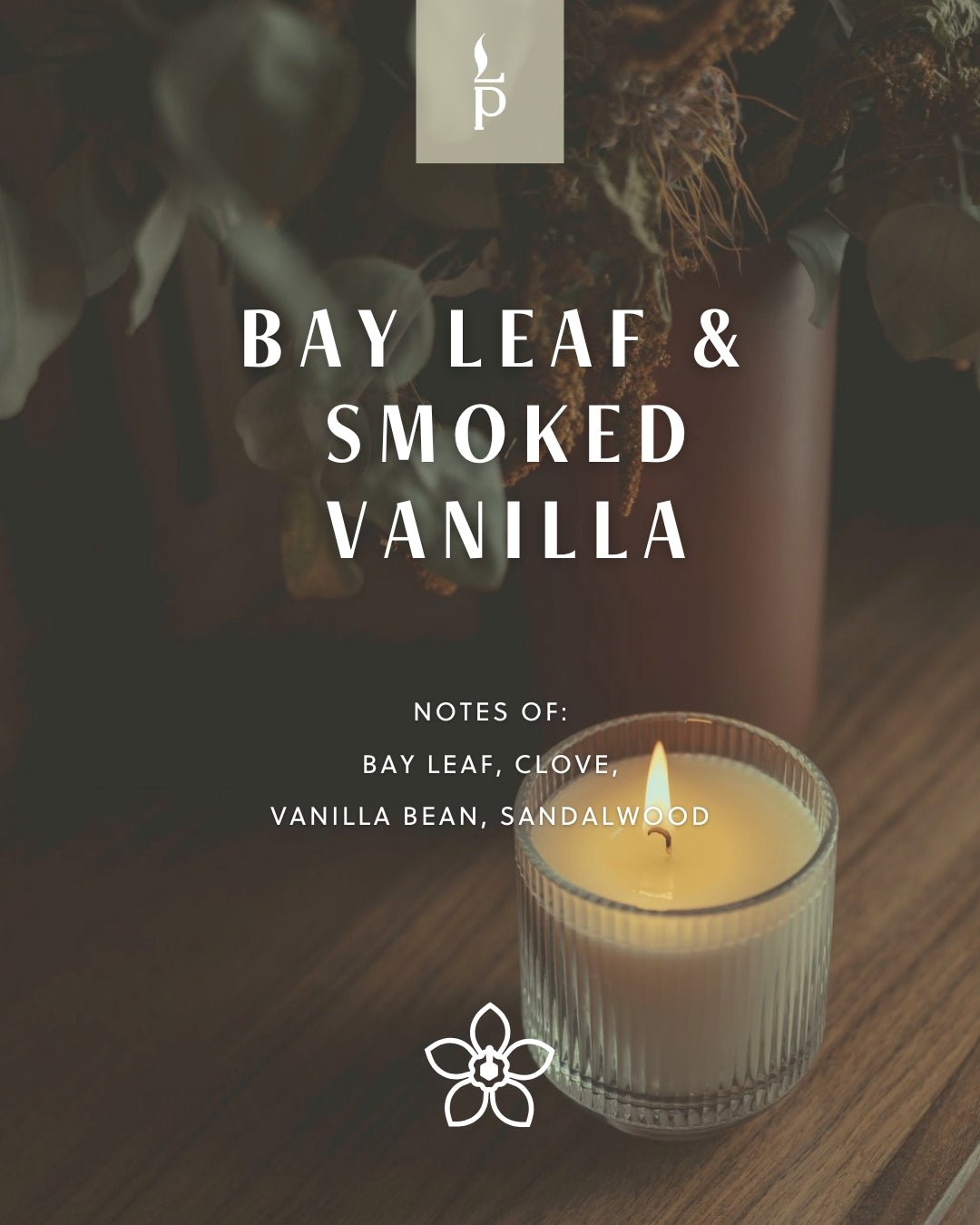 Bay Leaf and Smoked Vanilla winter sample tin shown lit in a glass vessel.