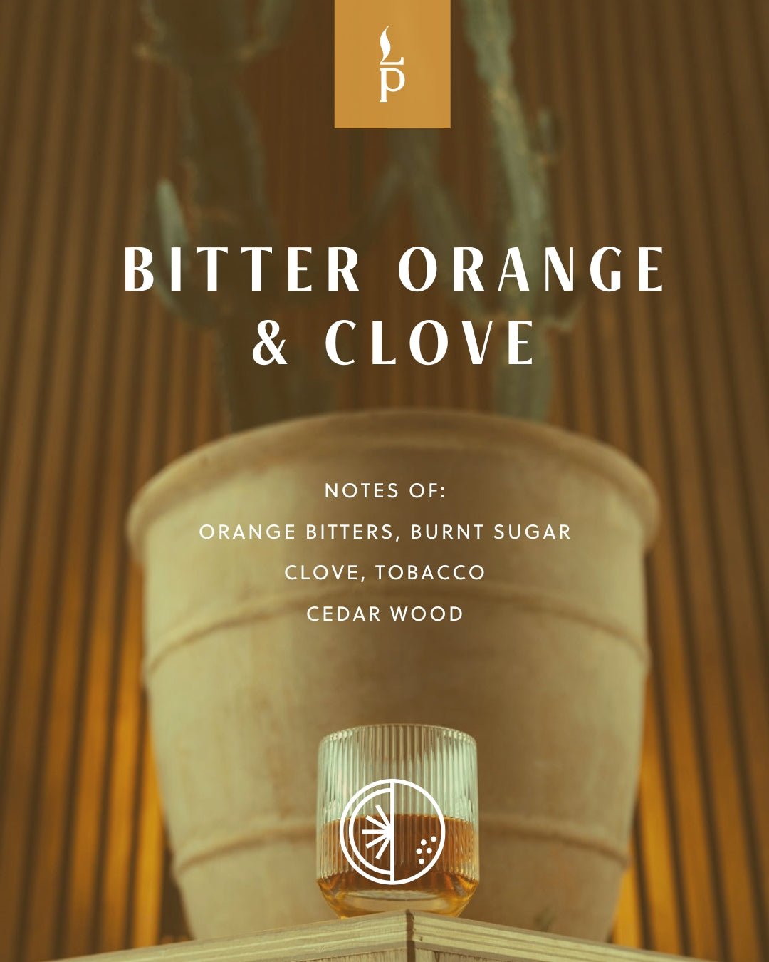 Bitter Orange & Clove winter sample tin with amber wax in a ribbed glass.