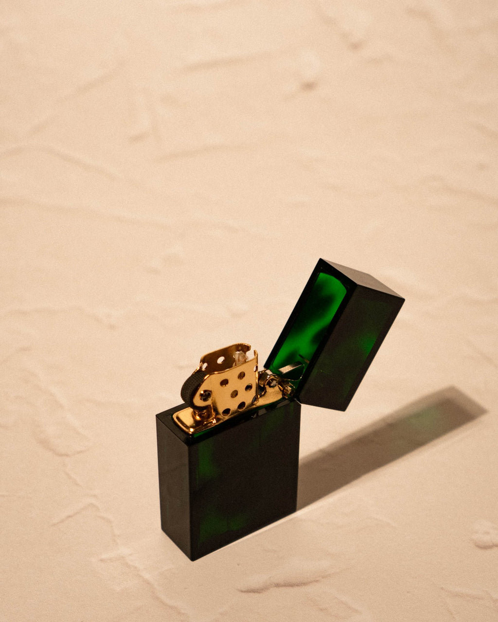 Tsubota Pearl Hard-edge Lighter marble green emerald pattern open with box nearby, made in Japan