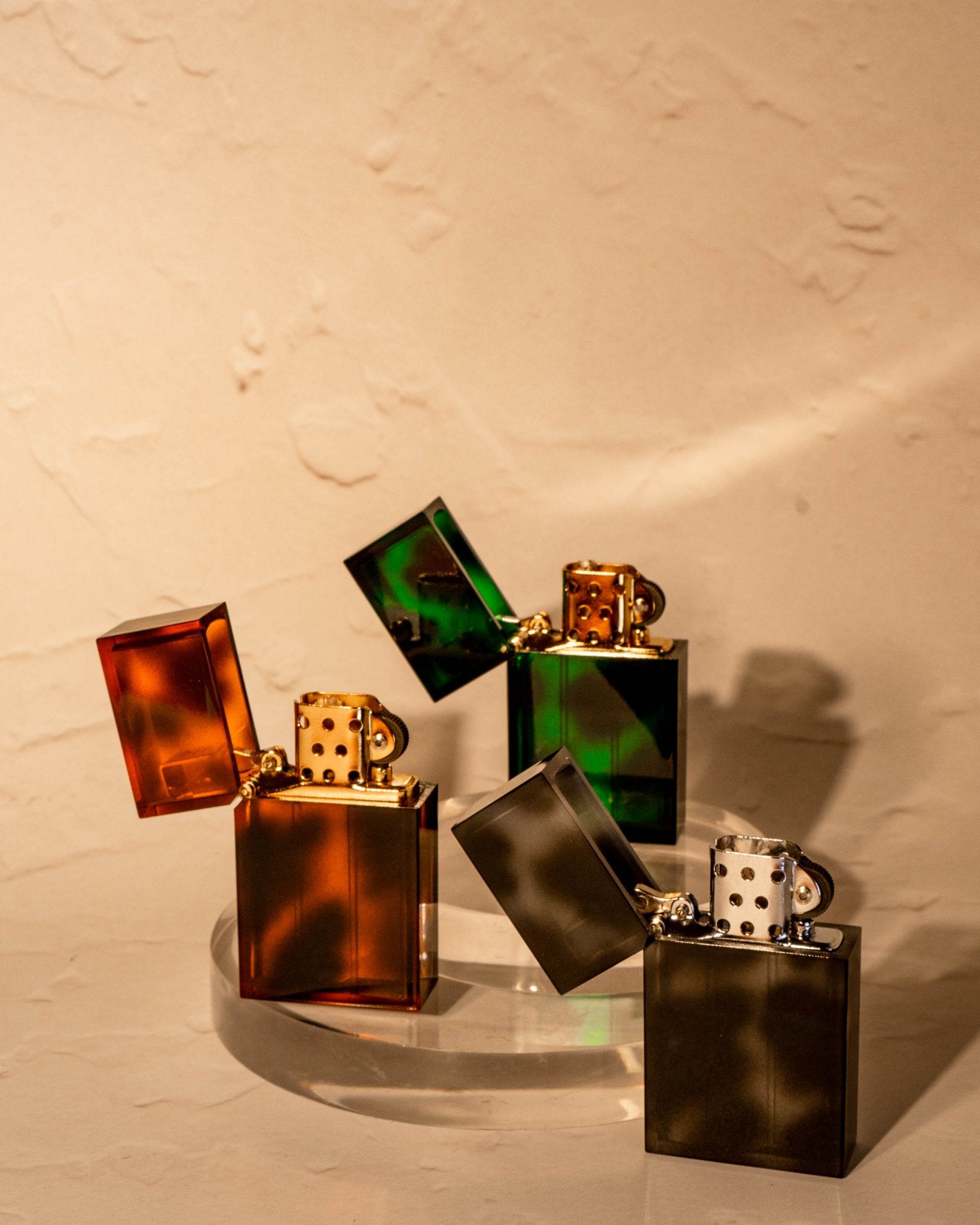 Group of Tsubota Pearl Hard-edge Lighters in assorted marbled finishes including green emerald, made in Japan