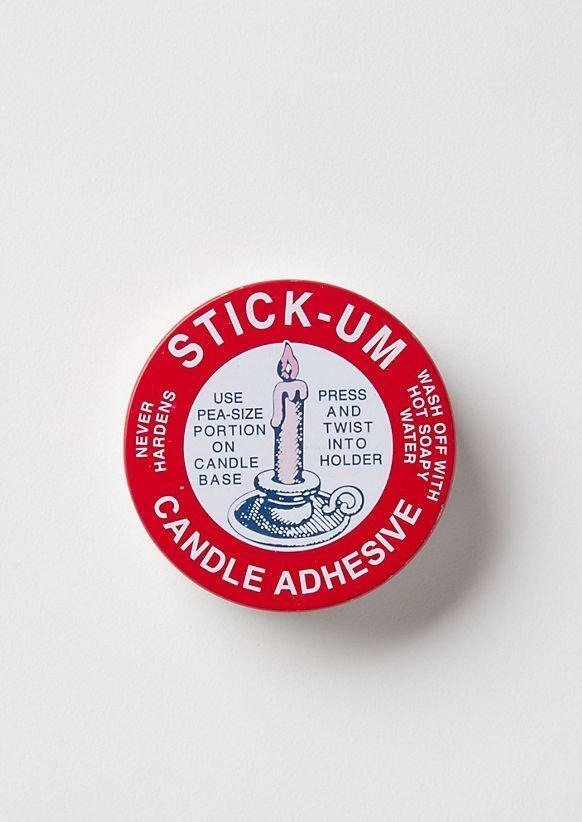 Stickum Candle Adhesive for securing beeswax tapers and refill candles safely in holders on white background